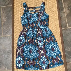 Blue patterned dress.